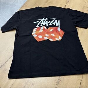 Stussy Black Tee with Orange Dice Back Graphic